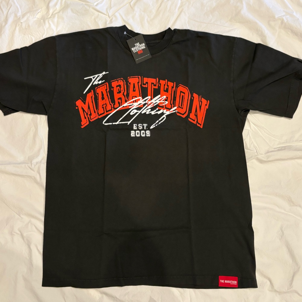 The Marathon Clothing Black Tee with Red Tag